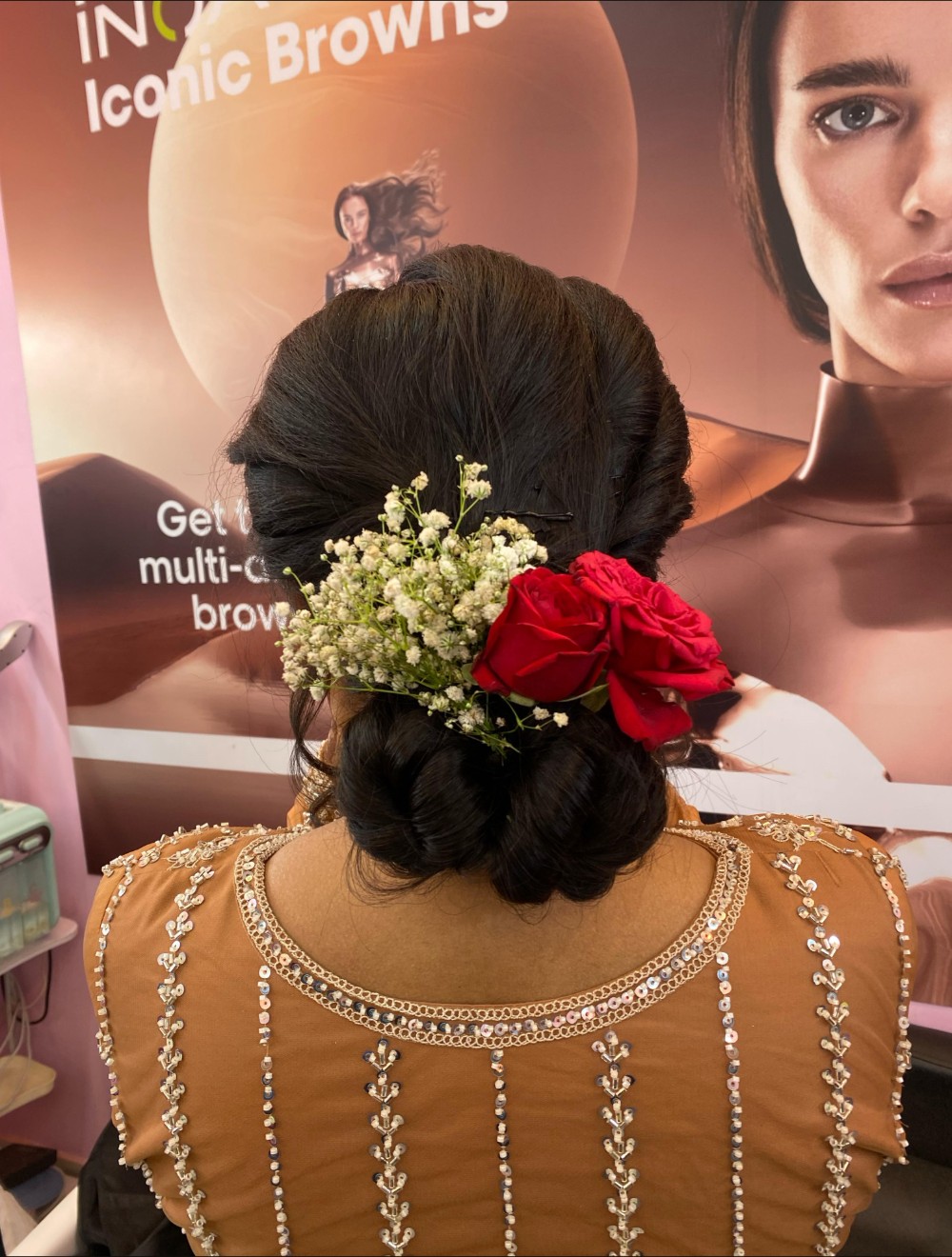 Bridal bun with jasmine and roses