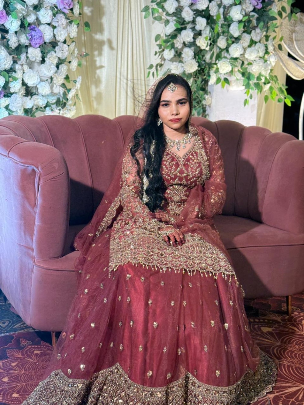 Bride in full bridal makeup and jewellery
